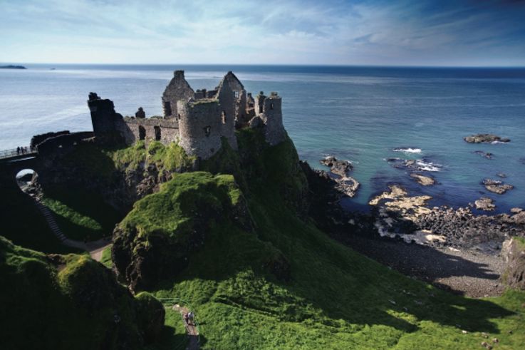 Dunluce Castle situated on cliffs of Causeway Coast